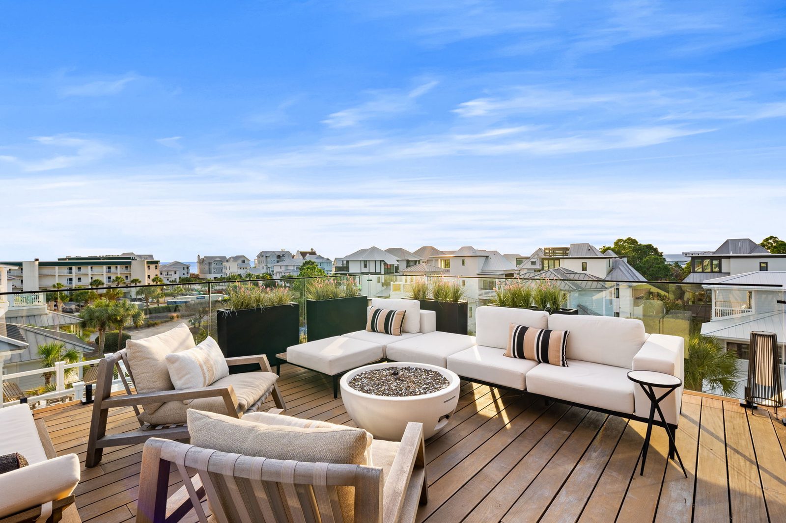Rooftop deck of a 30A luxury vacation rental at sunset